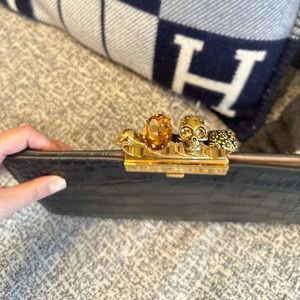 Alexander McOueen
Skull Four-Ring Croc-Embossed Leather Flat Pouch